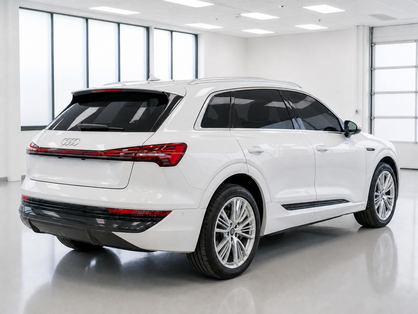 The same white Audi e-tron with 35 percent window tint, the shade most cars leave in