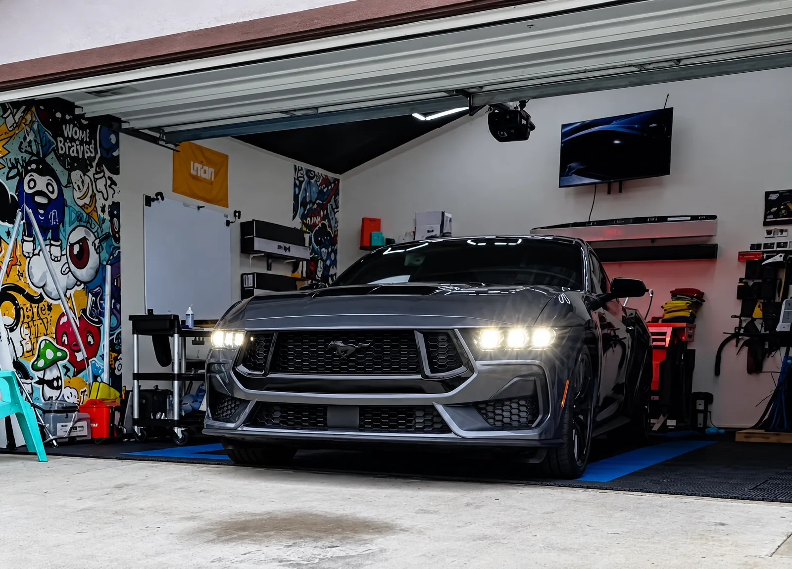 A gray Ford Mustang in the Tint-One workshop in Huntington Beach